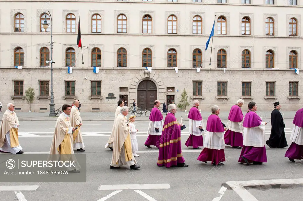 Catholic Corpus Christi procession, priests of various denominations taking part in parade, Ludwigstrasse street, Munich, Upper Bavaria, Bavaria, Germ...