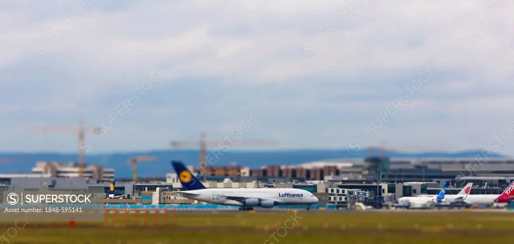 Lufthansa Airbus A380 at Frankfurt Airport, tilt-shift effect to give the impression of a miniature model due to reduced depth of field, Frankfurt am ...