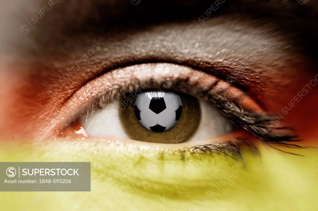 Woman's eye with the reflection of a soccer ball, women's soccer