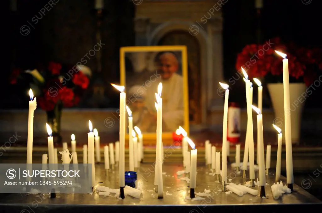 Votive candles in front of a photo of Pope John Paul II with Mother Teresa, parish church Église de la Madeleine, Sainte-Marie-Madeleine, St. Mary Mag...