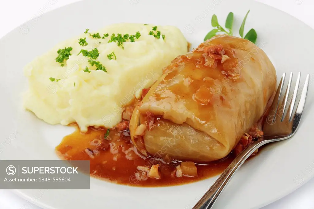 Stuffed cabbage with bacon sauce, mashed potatoes
