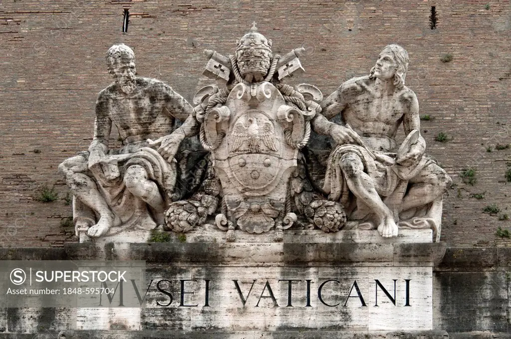 Statues of saints on the coat of arms of Pope Pius XI, portal to the Vatican Museums, Vatican Walls, Vatican City, Rome, Lazio, Italy, Europe