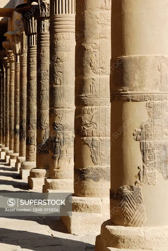 Arcade, stone pillars with reliefs and hieroglyphics, Temple of Philae, UNESCO World Heritage Site, Aswan, Nile Valley, Egypt, Africa