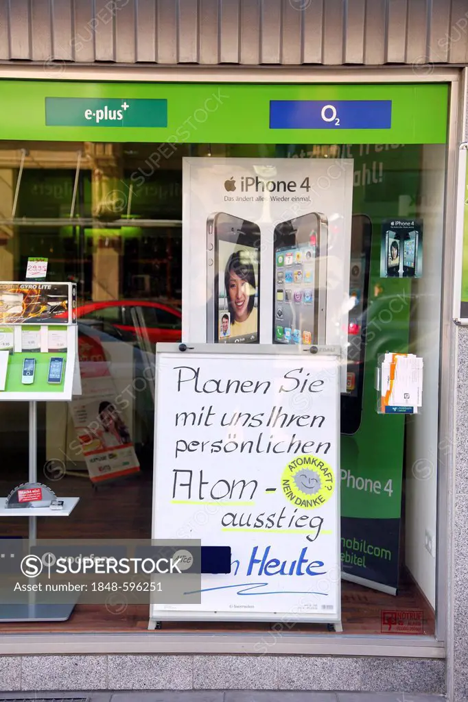 Mobilcom Debitel shop, advertising for personal phasing-out of using nuclear energy, Essen, North Rhine-Westphalia, Germany, Europe