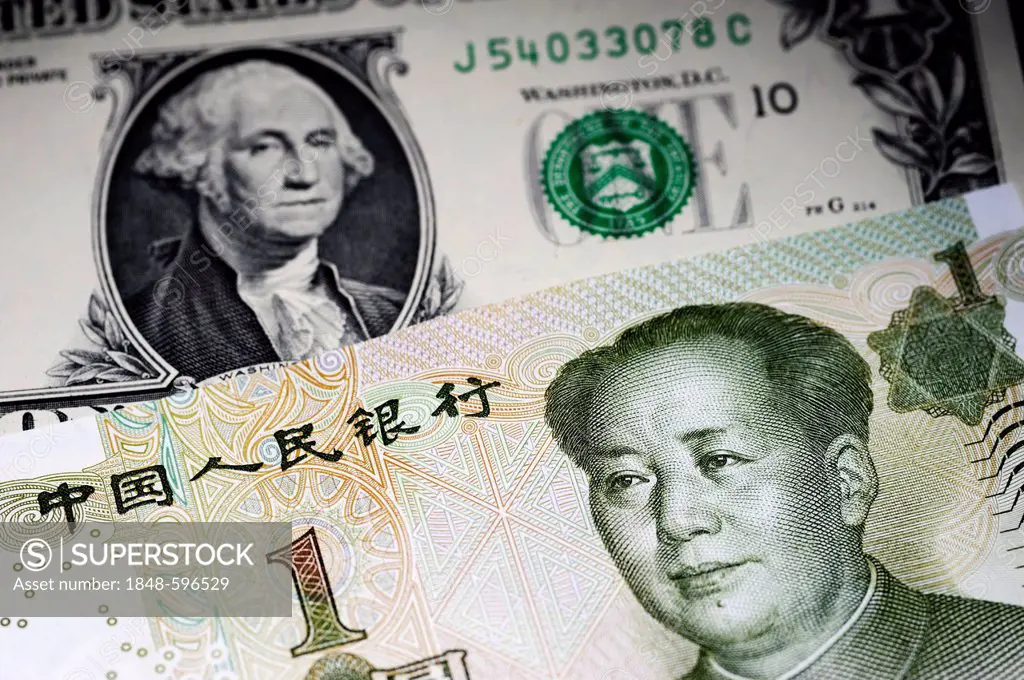 Notes, U.S. dollar and Chinese yuan, symbolic image for the dependency of the economy of the USA on China