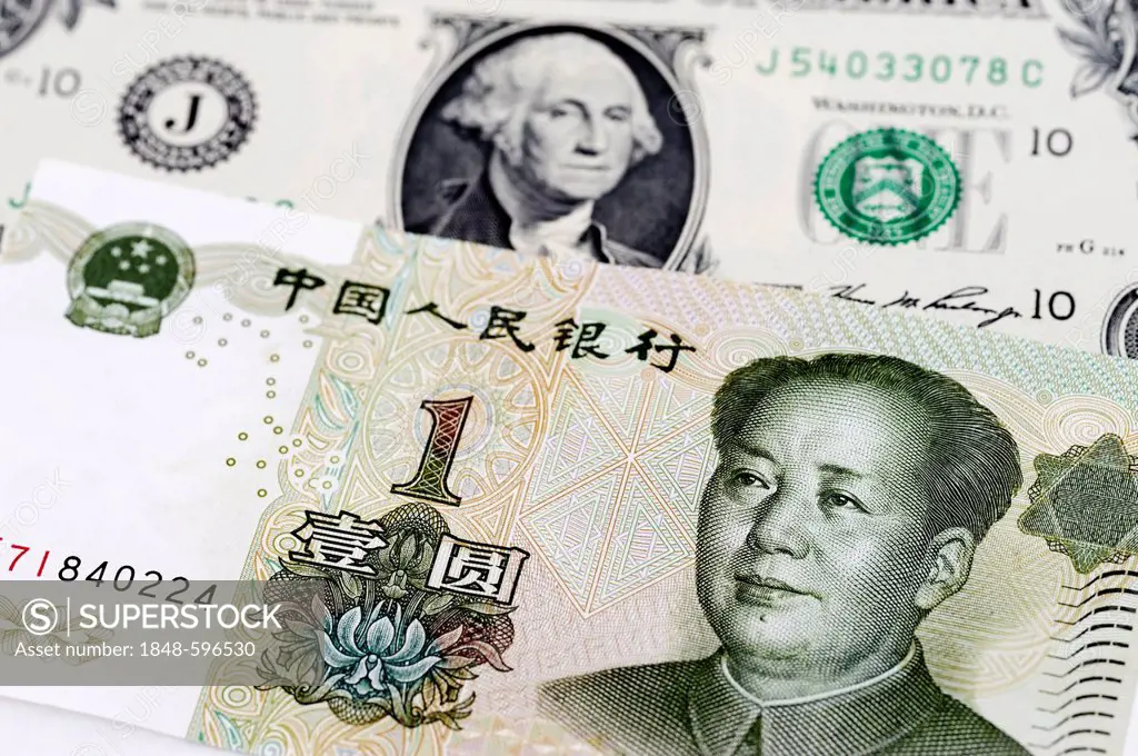 Notes, U.S. dollar and Chinese yuan, symbolic image for the dependency of the economy of the USA on China