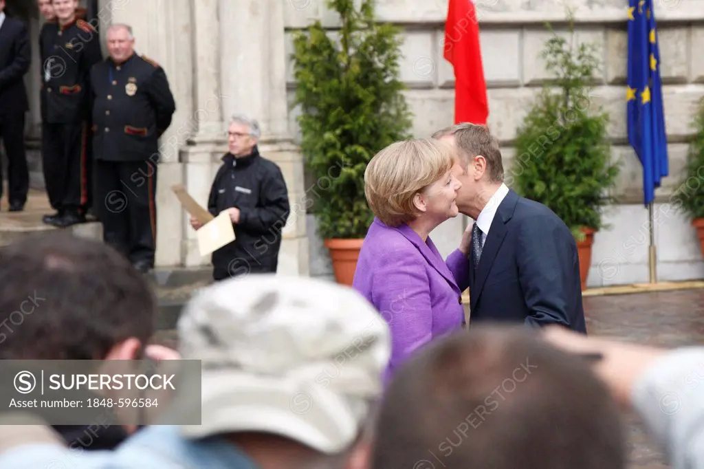 Welcome kiss of Angela Merkel and Donald Tusk, during the 20th anniversary of the fall of communism, 04/06/2009, in Krakow, Poland, Europe