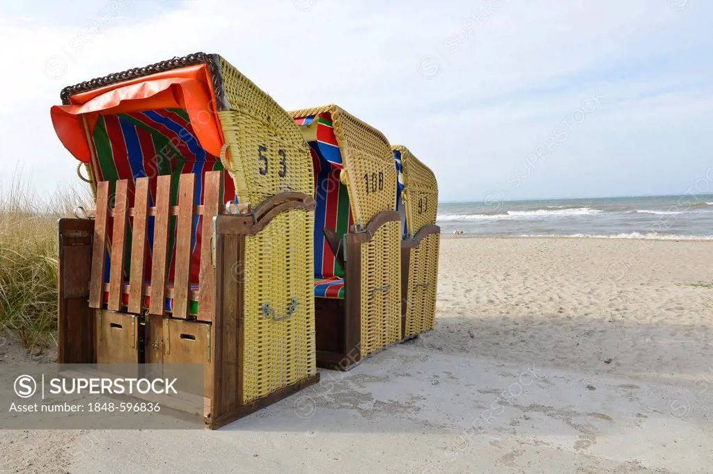 Roofed wicker beach chairs on the beach of Niendorf, Baltic Sea, Schleswig-Holstein, Germany, Europe