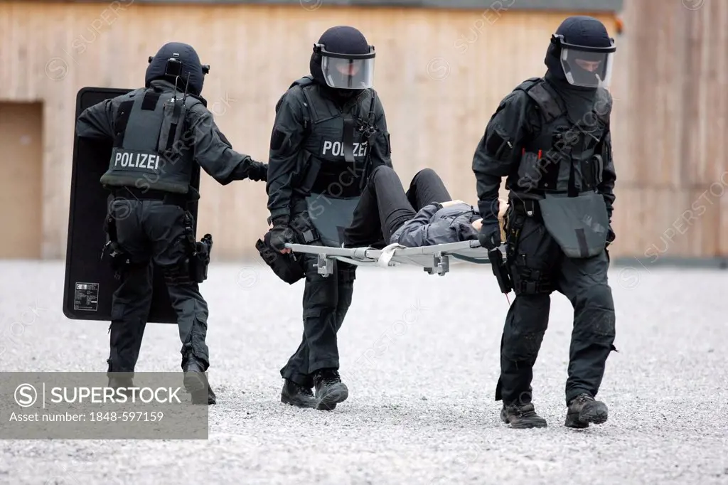 SEK or special response unit evacuating an injured hostage during an excercise, training center for special response units of the North Rhine-Westphal...