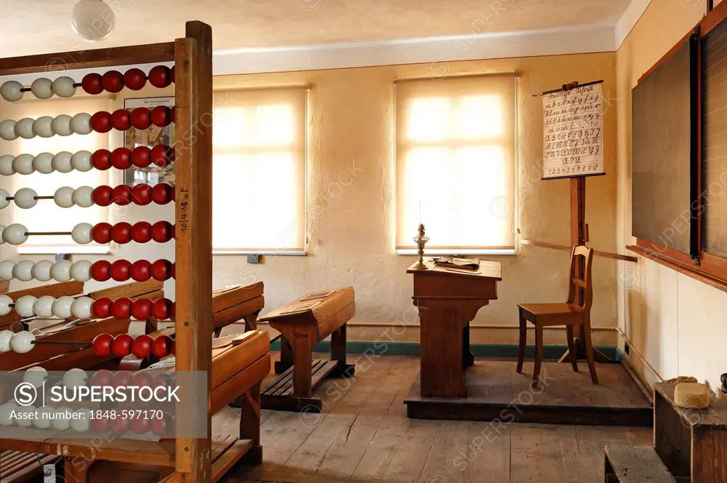 Classroom with teacher's desk and ABC board, on the left an abacus, 1935, school building from Pfaffenhofen, built in 1801, Franconian open-air museum...