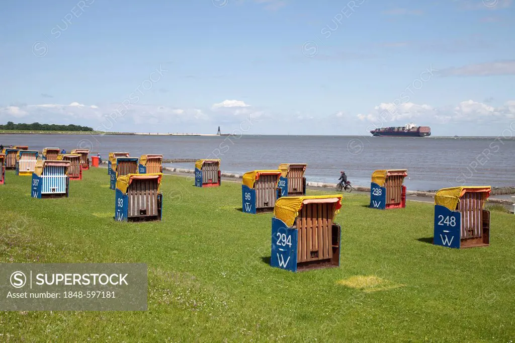 Roofed wicker beach chairs on the grassy beach, Cuxhaven, Lower Saxony, North Sea, Germany, Europe, PublicGround