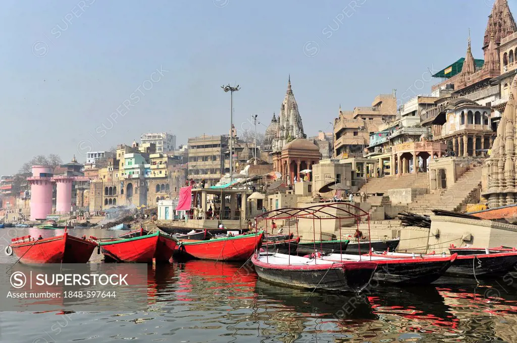 Boats and Ghats or steps on the Ganges River, Varanasi, Benares, Uttar Pradesh, India, South Asia