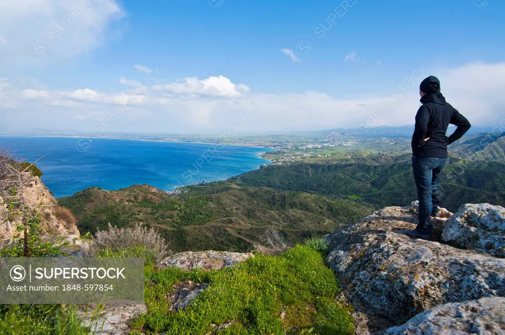 Woman enjoying the view over the Roman excavation site of Vouni, Northern Cyprus, Cyprus