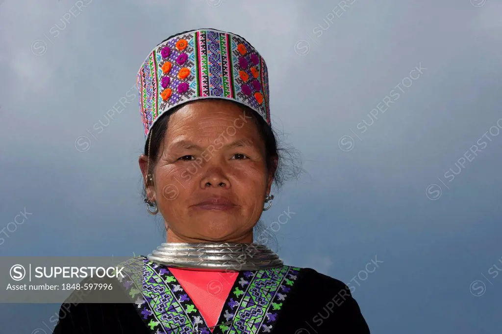 Woman in a traditional dress, costume, portrait, New Year festival, Hmong hill tribe, ethnic minority, Chiang Mai province, northern Thailand, Thailan...