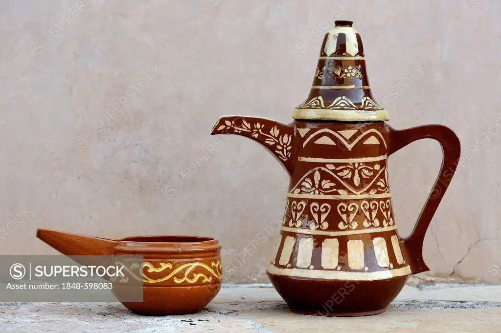Ceramic teapot and oil cup in the fort Nakhl in Oman, Middle East