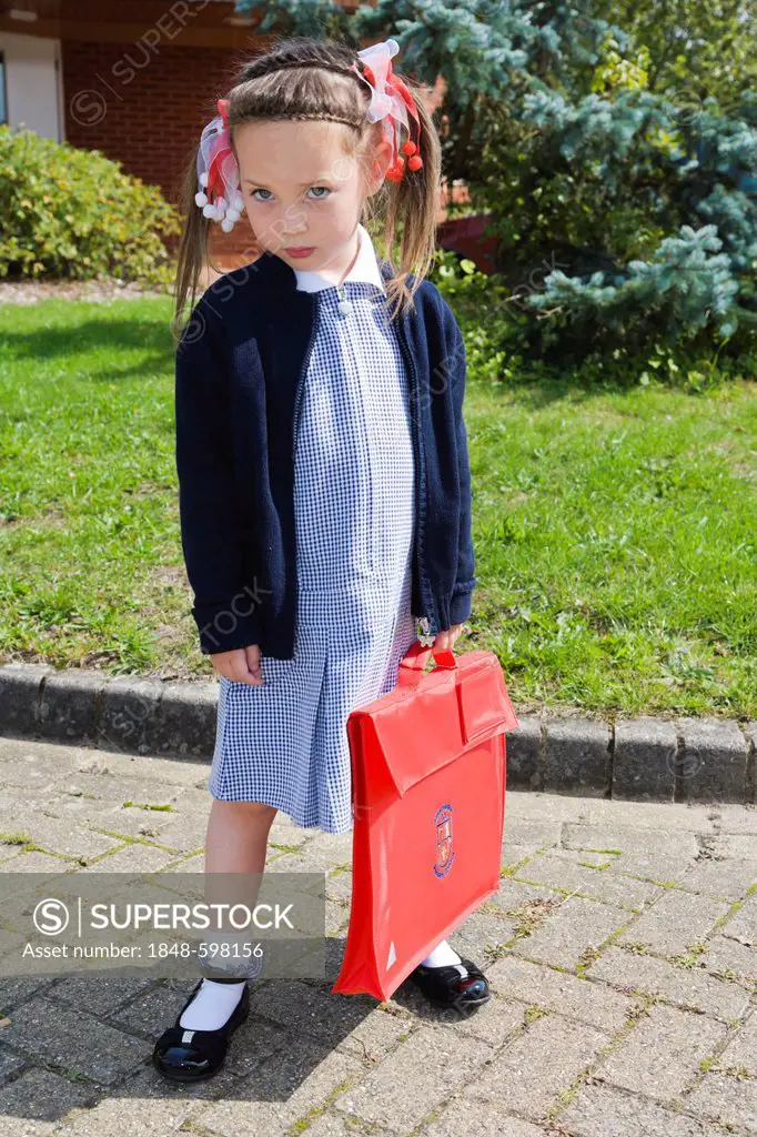 Schoolgirl, 4 years, in Gingham dress, summer school uniform, England, United Kingdom, Europe