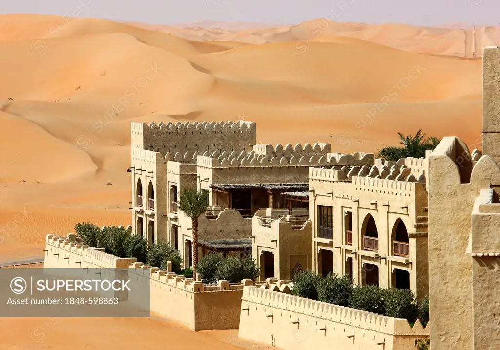 Desert luxury hotel Anantara Qasr Al Sarab, hotel resort built like a desert fort, surrounded by high sand dunes, near the Liwa oasis in the desert Em...