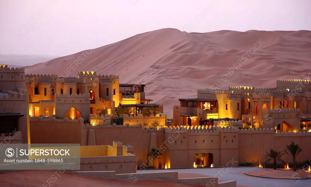 Desert luxury hotel Anantara Qasr Al Sarab, hotel resort built like a desert fort, surrounded by high sand dunes, near the Liwa oasis in the desert Em...