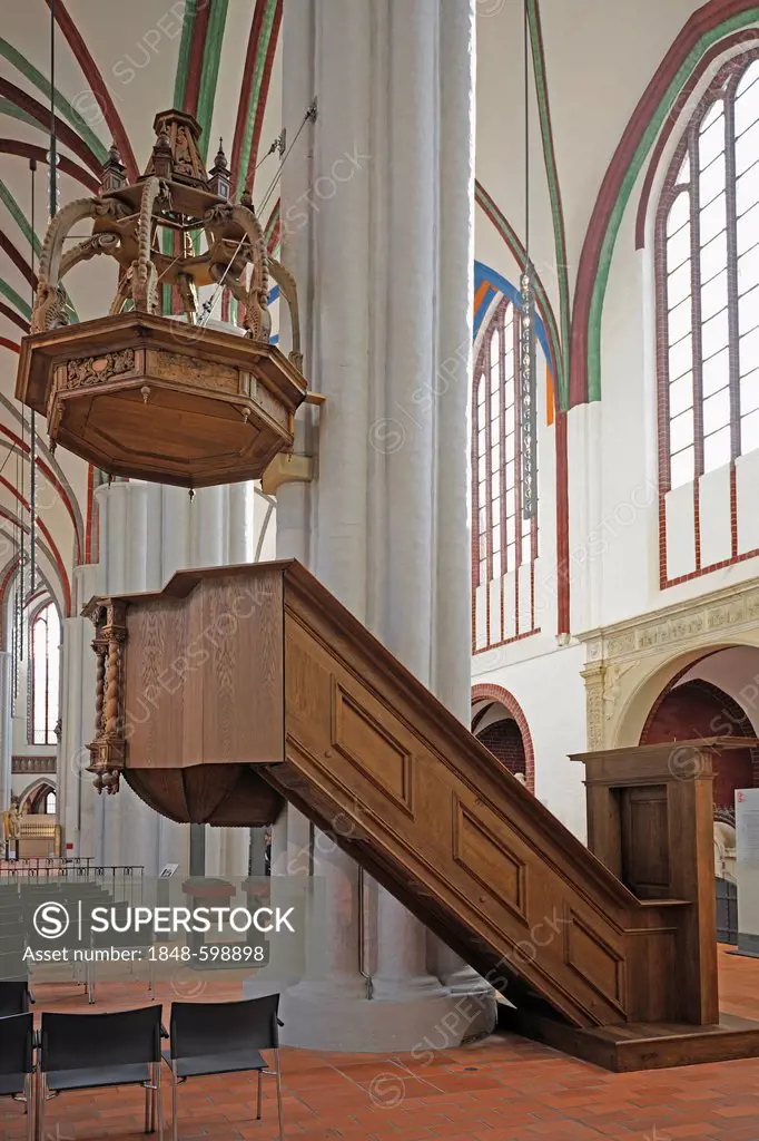 Carved pulpit in the renovated Nikolaikirche church, Berlin, Germany, Europe
