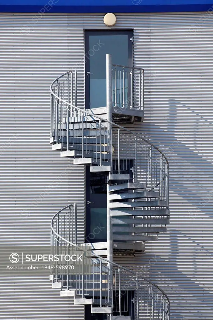 Spiral staircase, emergency exit, at an office building in Unterfoehring near Munich, Bavaria, Germany, Europe