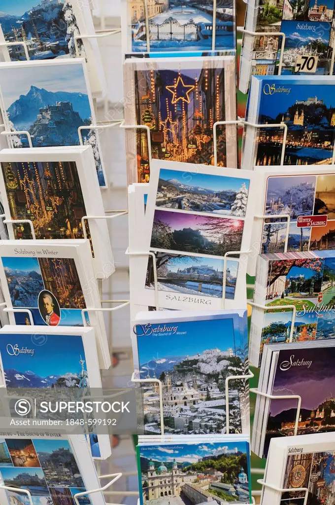 Colorful postcards on a sales rack, Salzburg, Austria, Europe