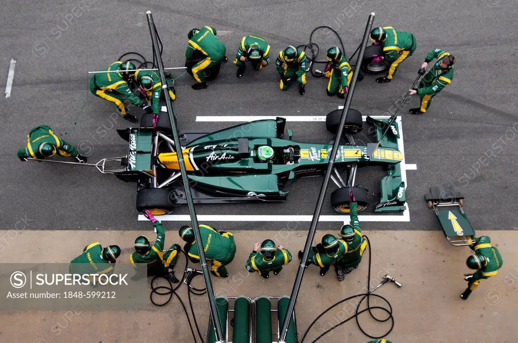 Pit stop for Finnish driver Heikki Kovalainen in his Team Lotus-Cosworth T128 car, motor sports, Formula 1 testing at the Circuit de Catalunya, Circui...