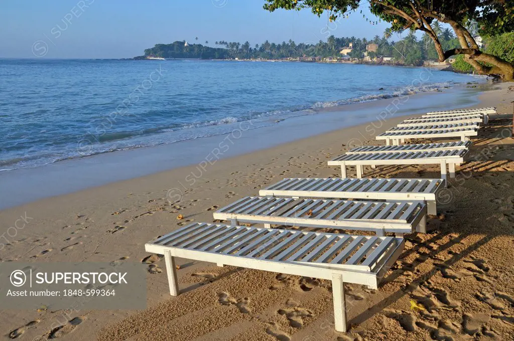 Empty beach chairs on the beach, Unawatuna, Sri Lanka, Ceylon, South Asia, Asia