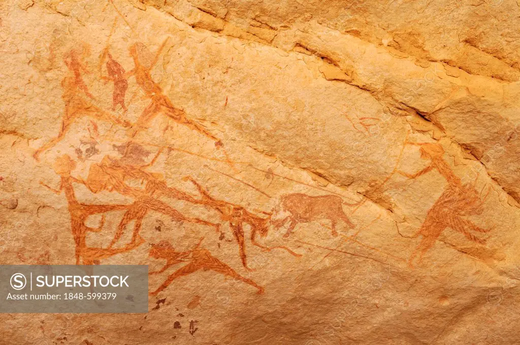 Lion hunt, neolithic rock art of the Tadrart, Tassili n'Ajjer National Park, Unesco World Heritage Site, Algeria, Sahara, North Africa