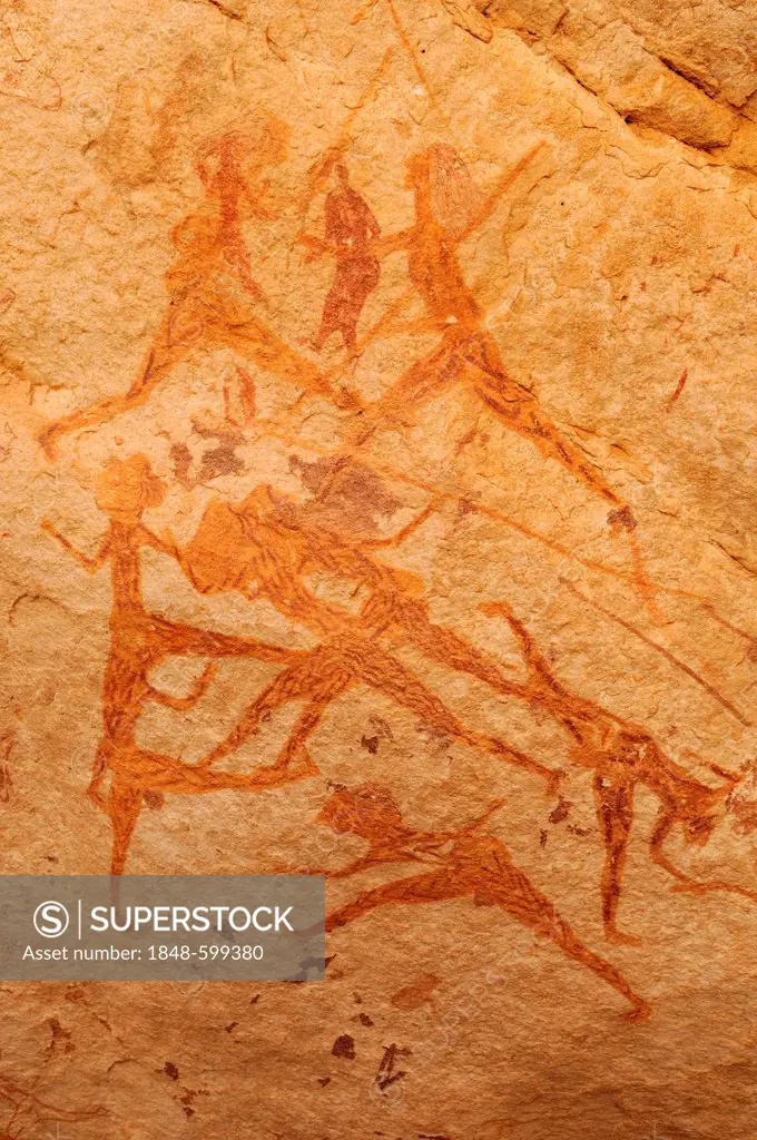 Hunting scene, neolithic rock art of the Tadrart, Tassili n'Ajjer National Park, Unesco World Heritage Site, Algeria, Sahara, North Africa