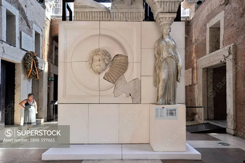 Reconstruction of the attic of the portico to the Forum of Augustus with the head of Jupiter Ammon, a Caryatid and marble architectural fragments, Mus...