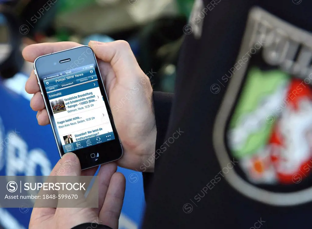 The police of North Rhine-Westphalia is the first authority to use a police app, an application for the iPhone and other smartphones, Duesseldorf, Nor...