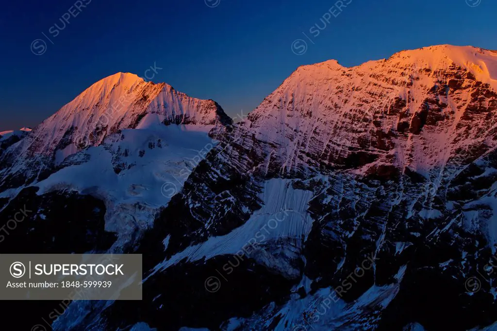 View during the ascent of Mt Ortler overlooking to Mt Koenigspitze and Mt Gran Zebrù at dawn, Ortler massif, South Tyrol, Italy, Europe