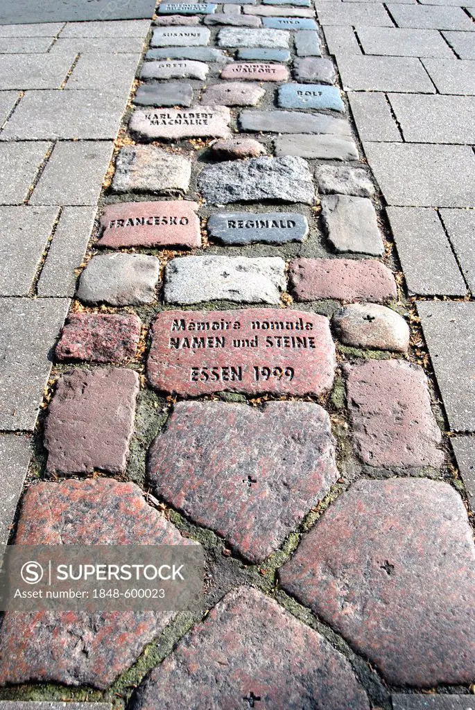 Spur II, installation, cobblestones with names reminiscent of people who have died of AIDS, part of the project Denkraum, thinking space, stones and n...