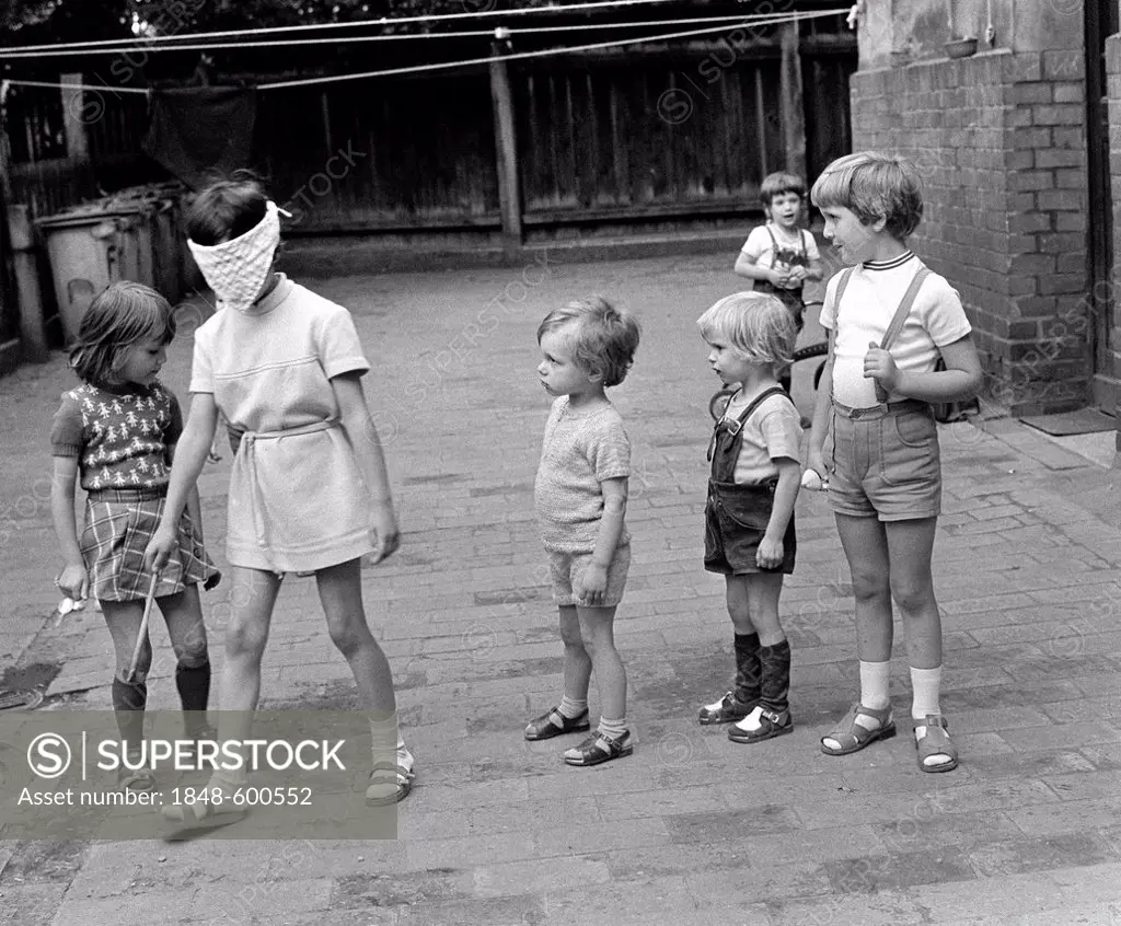 Children playing blind man's buff, Leipzig, East Germany, about 1976