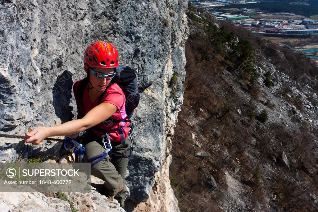 Climbing the Albano fixed rope route near Mori, Lake Garda region, Trentino-Alto Adige, Italy, Europe