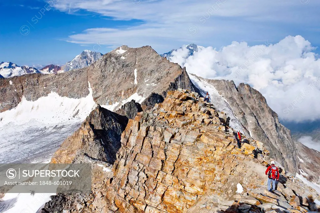 Descending from Hohe Angelus mountain, Ortler mountain, Koenigspitze mountain and Vertainspitze mountain at the back, Ortler Alps, province of Bolzano...