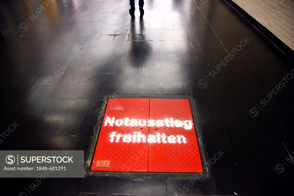Emergency exit, lettering Notausstieg freihalten, German for Emergency exit, keep clear, bottom flap