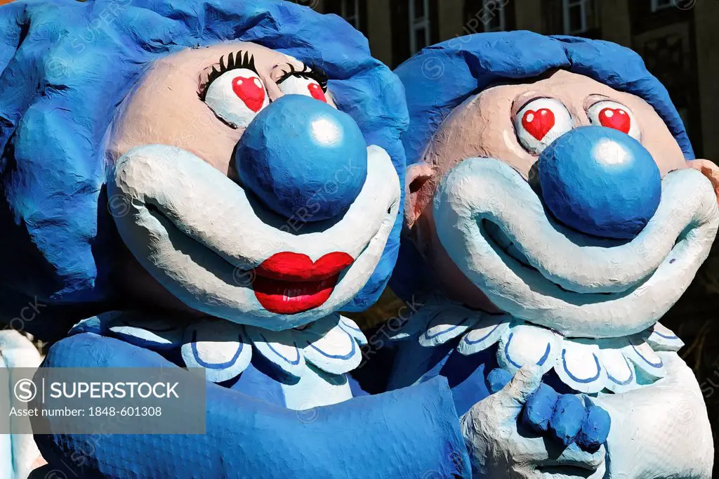 Funny clown pair, hand in hand, paper-mache figures, parade float at the Rosenmontagszug Carnival Parade 2011, Duesseldorf, North Rhine-Westphalia, Ge...