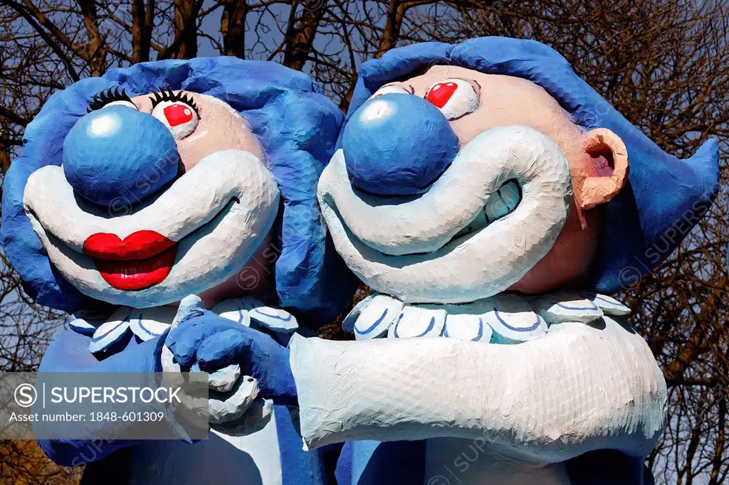 Funny clown pair, hand in hand, paper-mache figures, parade float at the Rosenmontagszug Carnival Parade 2011, Duesseldorf, North Rhine-Westphalia, Ge...