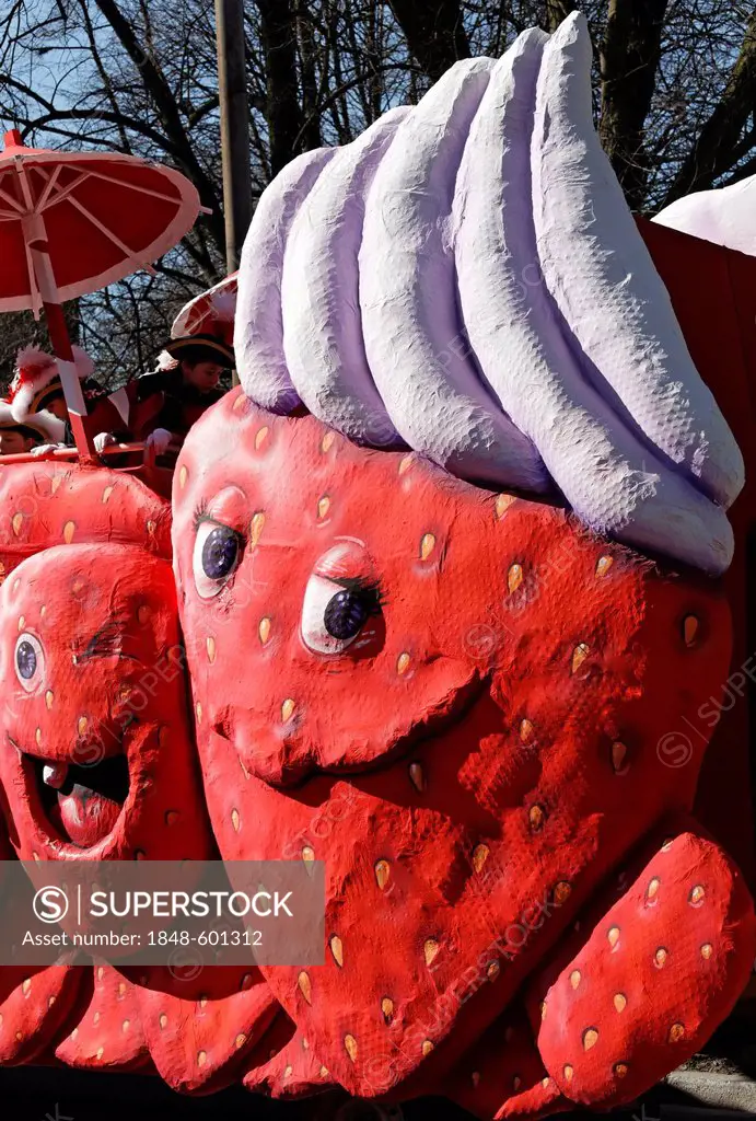 Funny strawberry with cream, cartoon style paper-mache figure, parade float at the Rosenmontagszug Carnival Parade 2011, Duesseldorf, North Rhine-West...