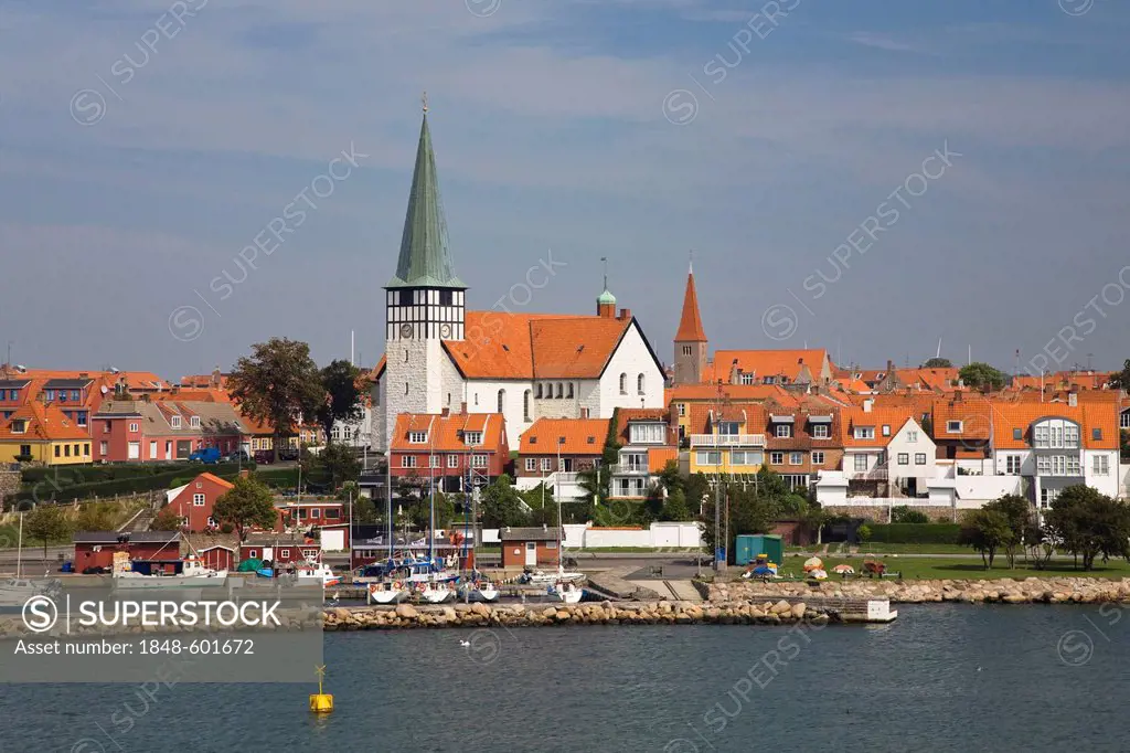 Timber-frame houses, lighthouse and church Skt. Nicolaj Kirke in Rønne, Bornholm, Denmark, Europe