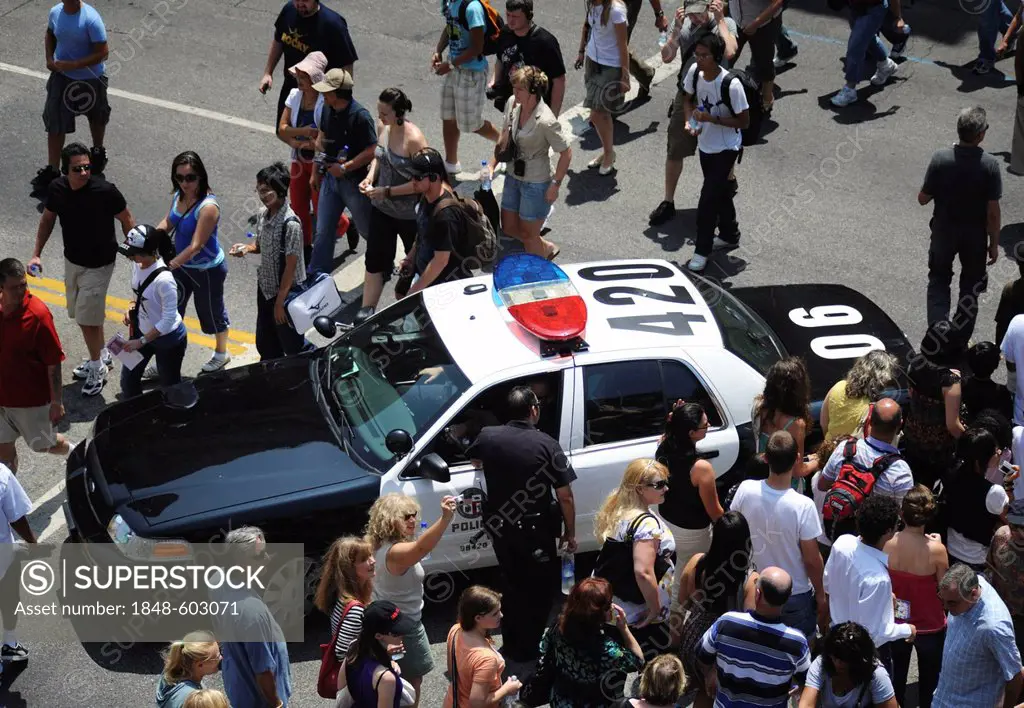 Police car operating at a film awards show in Hollywood, California, USA