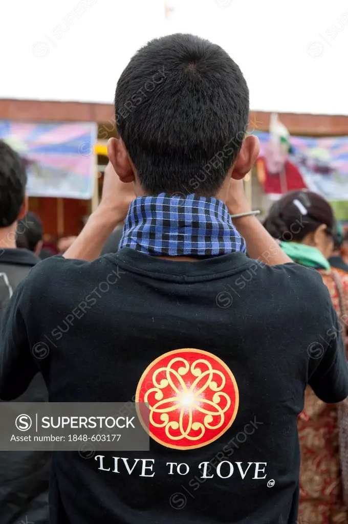 Tibetan festival, a young man wearing a T-shirt with the message, Live to Love, Leh, Ladakh district, Jammu and Kashmir, India, South Asia, Asia