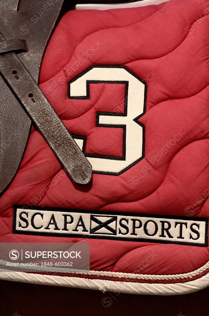 Red saddle blanket with embroidery, Scapa Sports, number 3, Airport Arena Polo Event 2010, Munich, Upper Bavaria, Bavaria, Germany, Europe