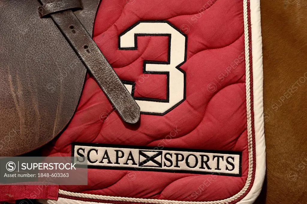 Red saddle blanket with embroidery, Scapa Sports, number 3, Airport Arena Polo Event 2010, Munich, Upper Bavaria, Bavaria, Germany, Europe