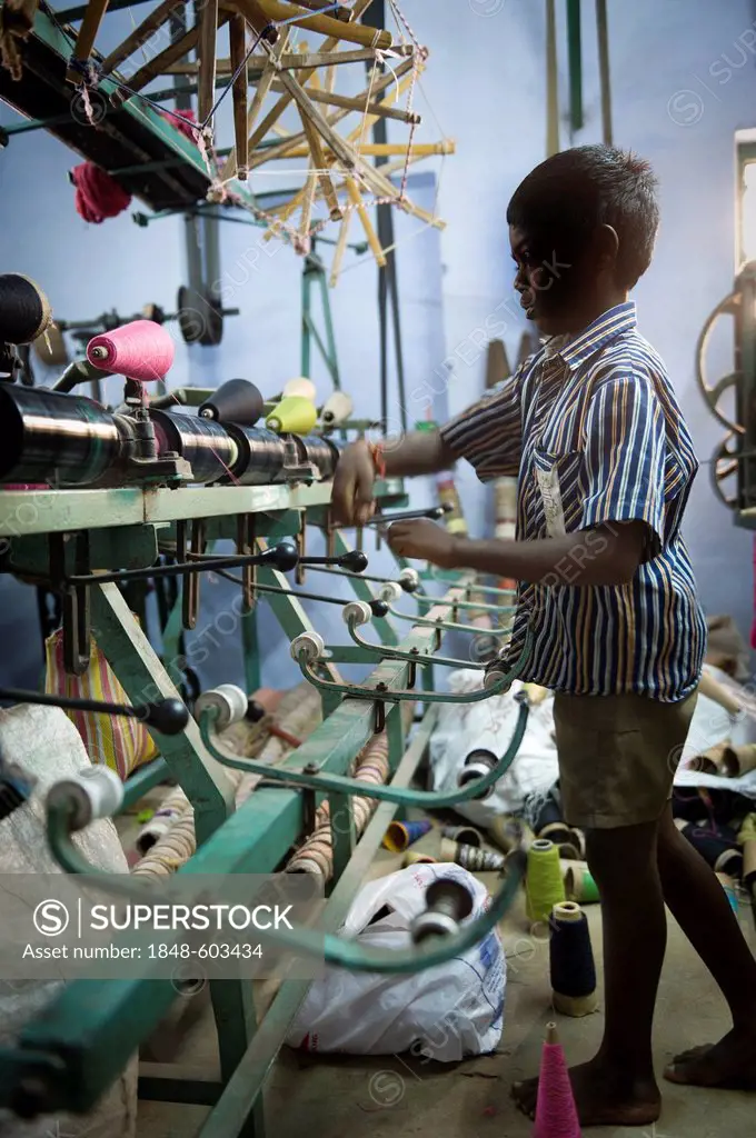 11-year-old child labourer in a mosquito net factory, Karur, Tamil Nadu, India, Asia