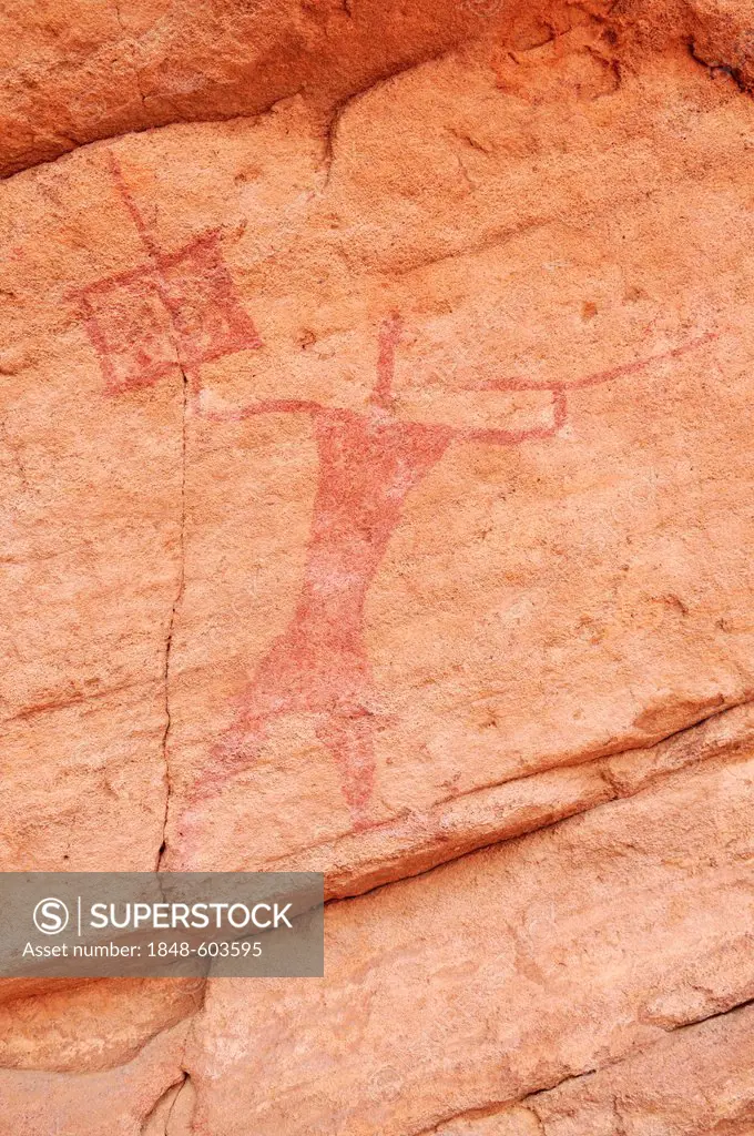 Painted warrior, neolithic rockart of the Acacus Mountains or Tadrart Acacus range, Tassili n'Ajjer National Park, Unesco World Heritage Site, Algeria...