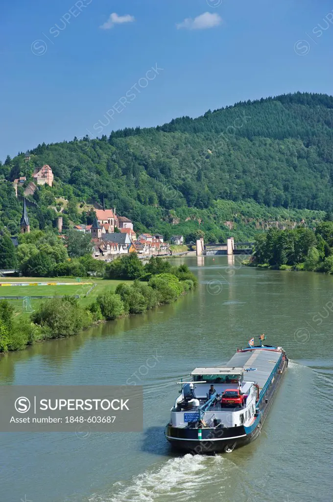 Townscape with the Neckar river and a cargo ship, Hirschhorn, Neckartal Odenwald Nature Park, Hesse, Germany, Europe