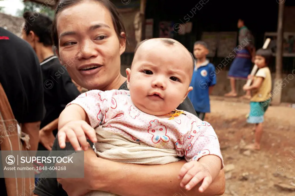 Karen mother and her baby in the Mae La refugee camp, Tak province, Thailand, Asia