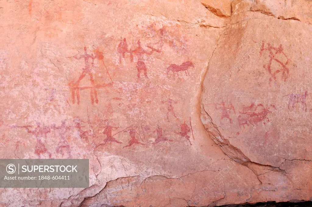 Painted people, neolithic rockart of the Acacus Mountains or Tadrart Acacus range, Tassili n'Ajjer National Park, Unesco World Heritage Site, Algeria,...